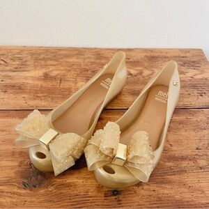 Mel by Melissa Mini Mel Dreamgirl Gold Gel Bow Flats